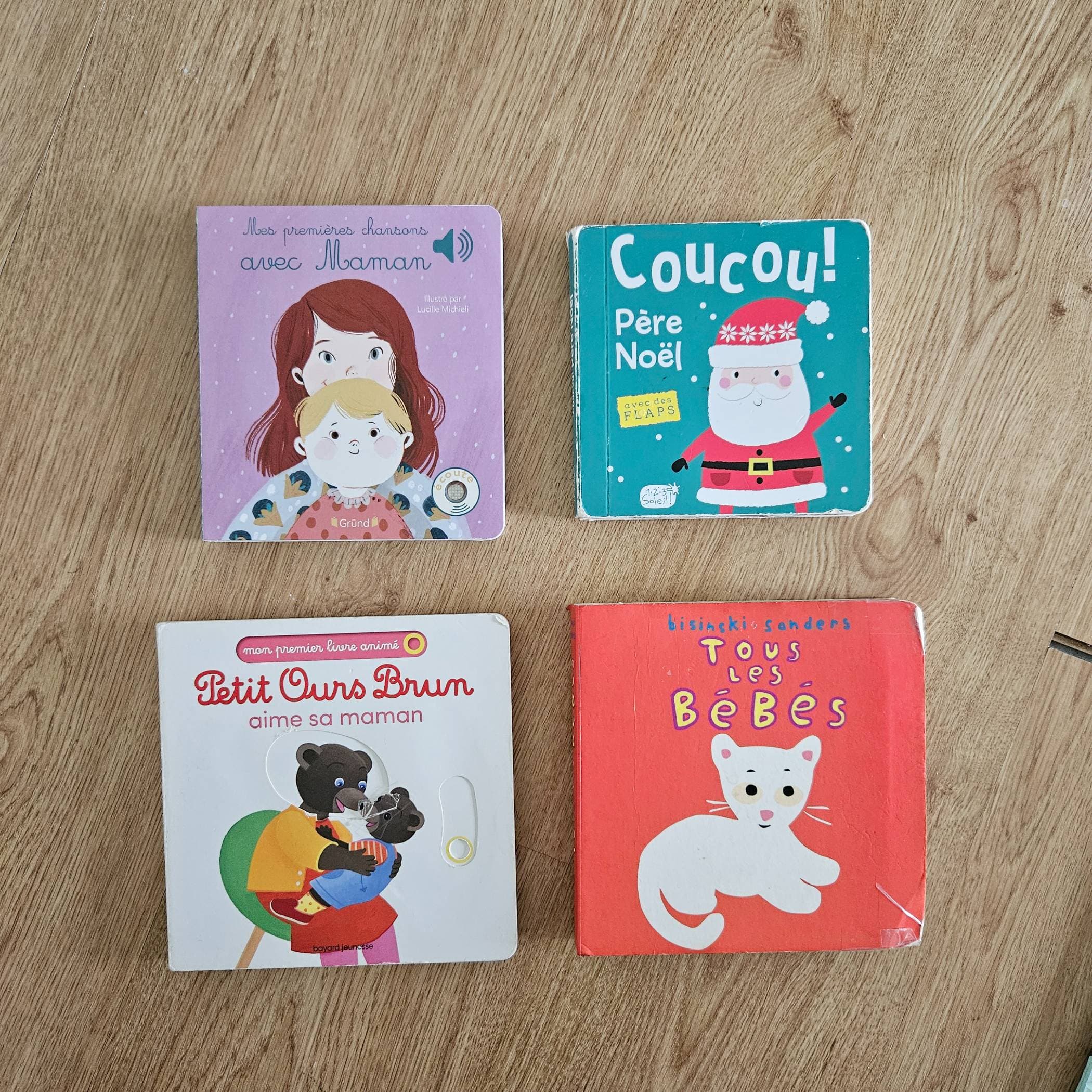 4 baby books in French